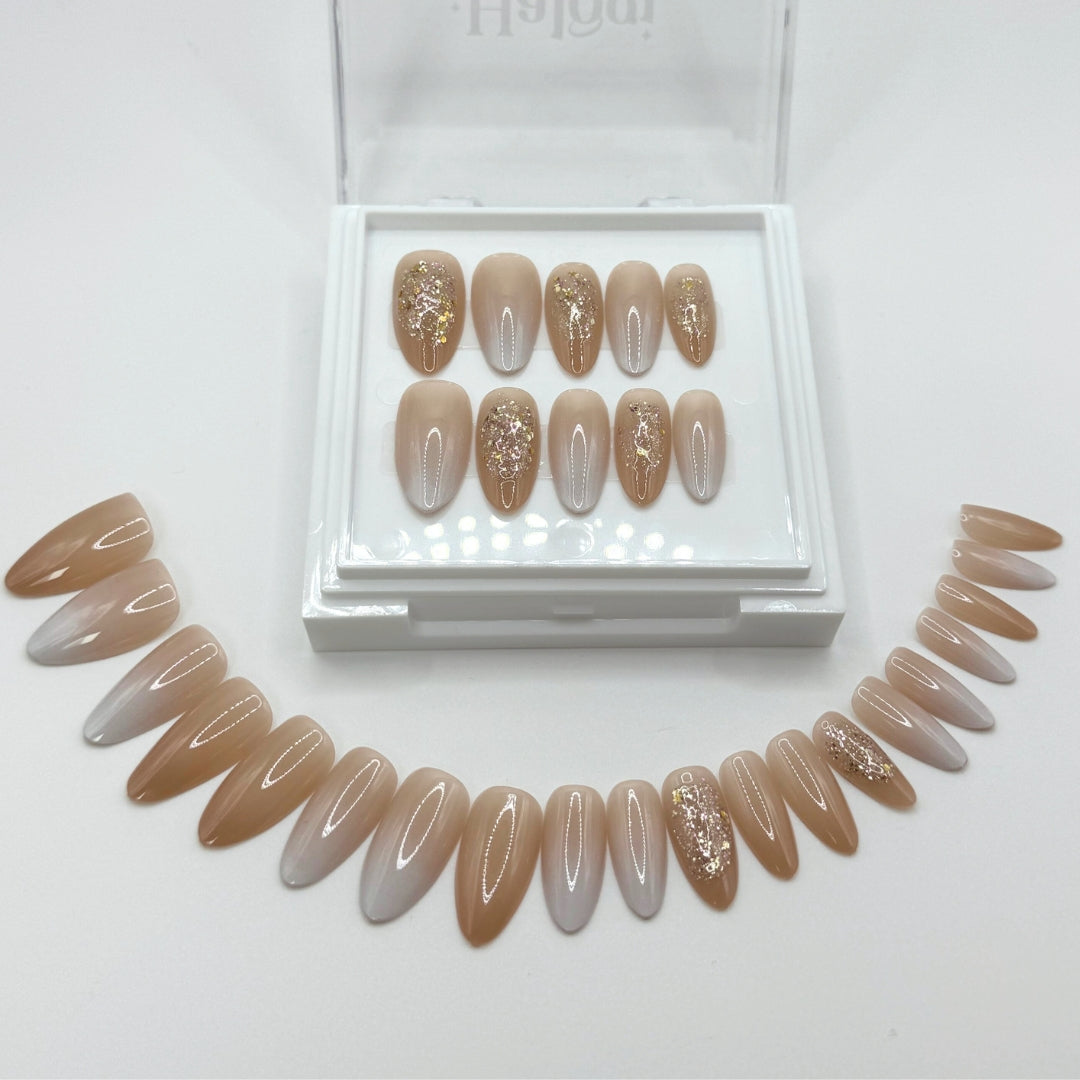 Stardust Glow - Nude & White Glitter Press-On Nails
Includes 30 piece press-on nails