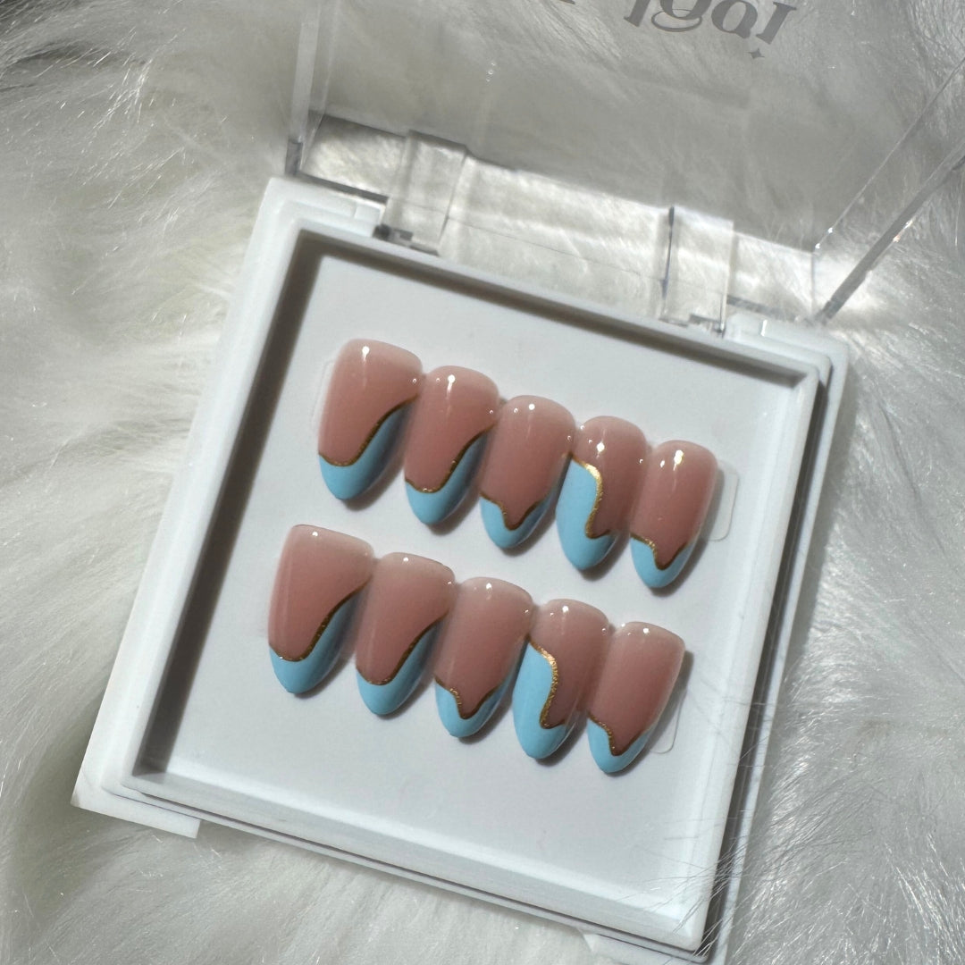 Dreamy Waves - Pinkish Nude Press-On Nails with Baby Blue Swirly Tips
Includes 30 piece press-on nails