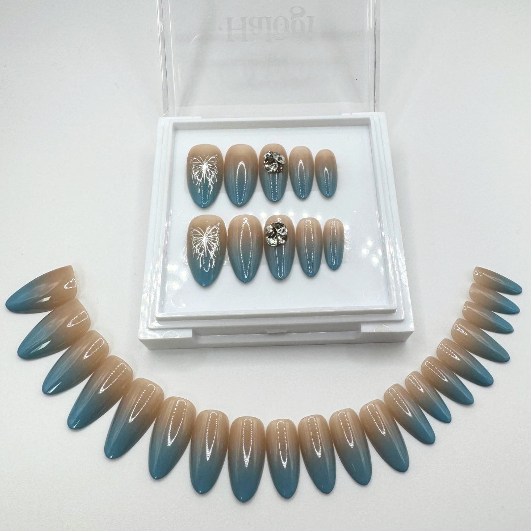 Diamond Aura - Nude & Baby Blue Tip Press-On Nails
Includes 30 piece press-on nails