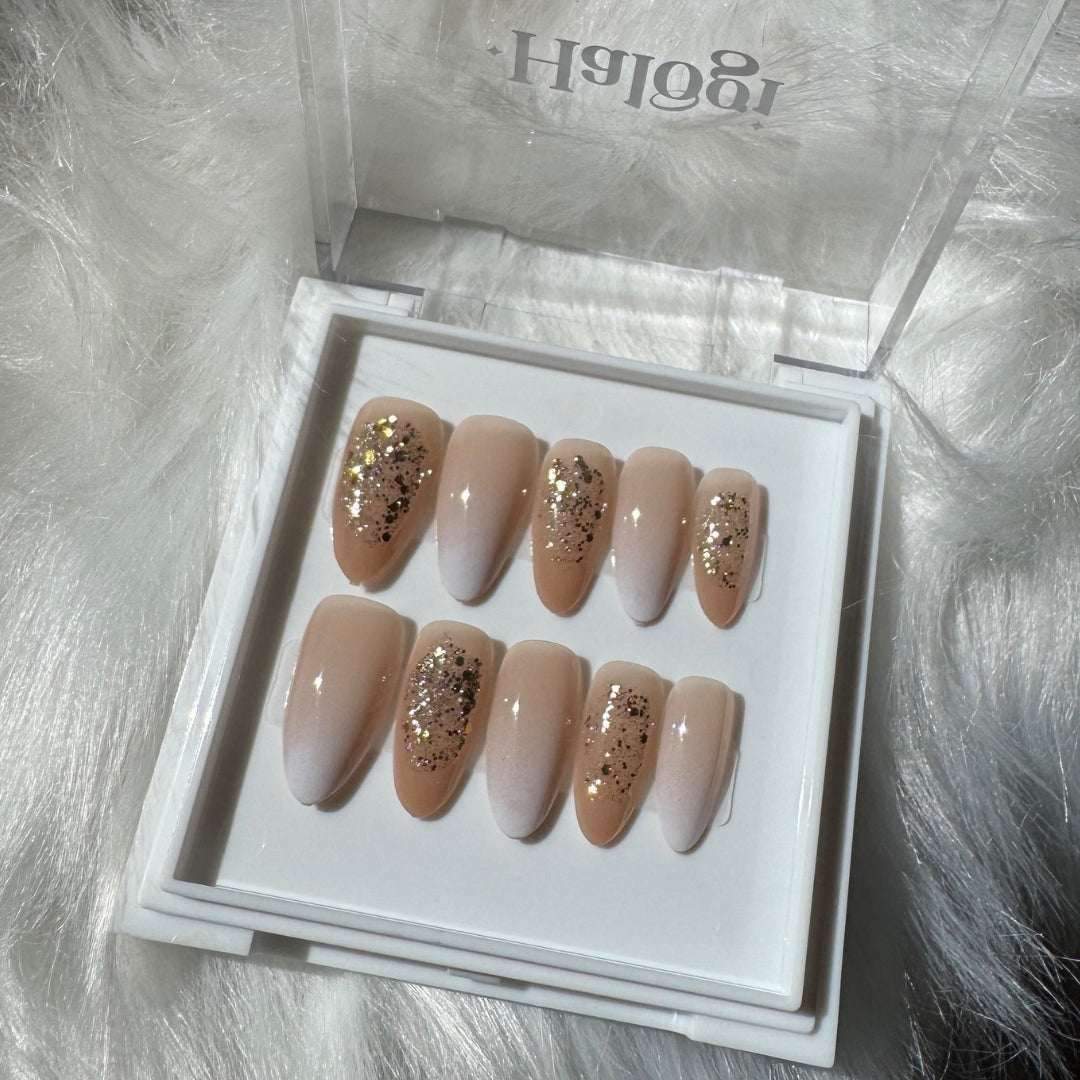 Stardust Glow - Nude & White Glitter Press-On Nails
Includes 30 piece press-on nails