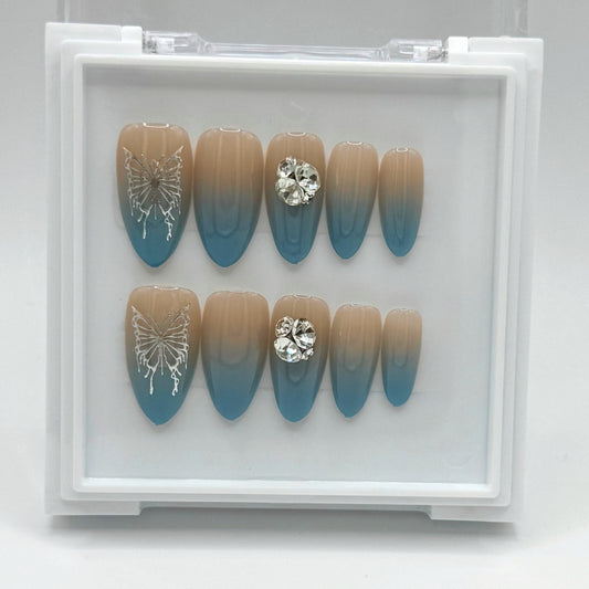 Diamond Aura - Nude & Baby Blue Tip Press-On Nails
Includes 30 piece press-on nails