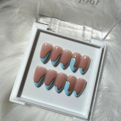 Dreamy Waves - Pinkish Nude Press-On Nails with Baby Blue Swirly Tips
Includes 30 piece press-on nails