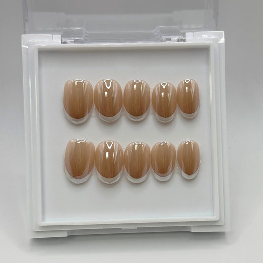 Luminous French - Pearly Nude Press-On Nails with Thin White French Tips
Includes 30 piece press-on nails
