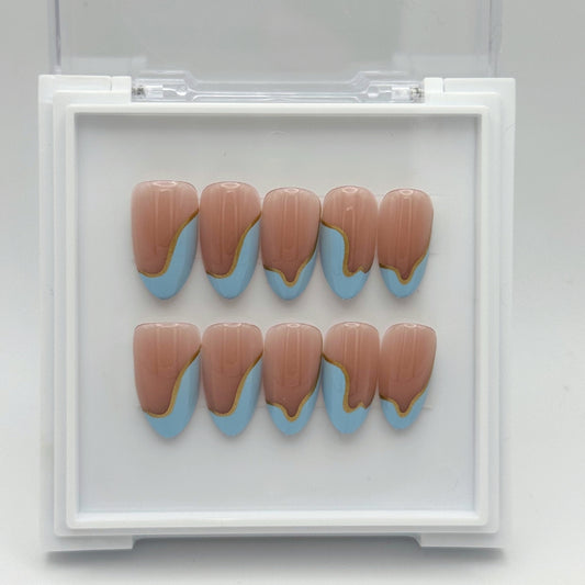 Dreamy Waves - Pinkish Nude Press-On Nails with Baby Blue Swirly Tips
Includes 30 piece press-on nails