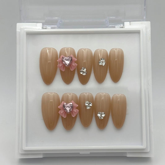 Timeless Bows - Nude Press-On Nails with Bow Designs & Diamond Accents
Includes 30 piece press-on nails