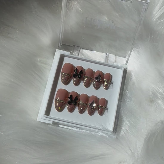 Midnight Bows - Deep Nude Press-On Nails with Glitter Tips, Black Bows
Includes 30 piece press-on nails